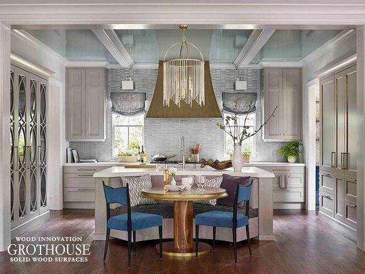 This transitional kitchen designed by Matthew Quinn feautres a Grothouse Edge Grain Kitchen Table.