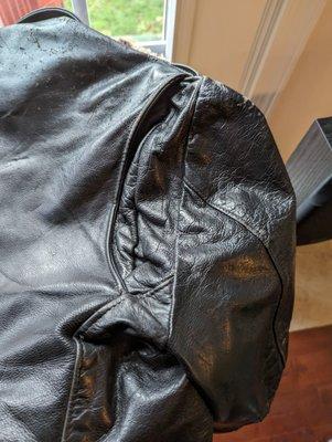 Leather biker jacket, rear shoulder