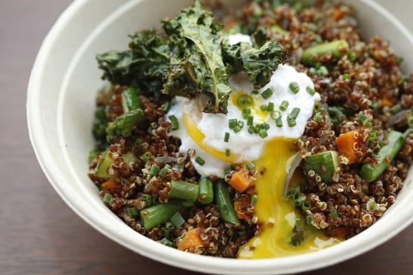 Quinoa bowl with veggies with poached egg