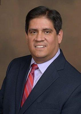 Dr. Carlos Ramirez