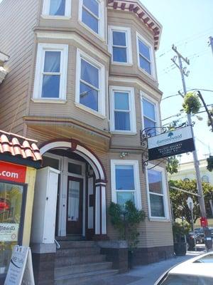 The office on the corner of Diamond & 18th in the Castro. Entrance is the middle door.