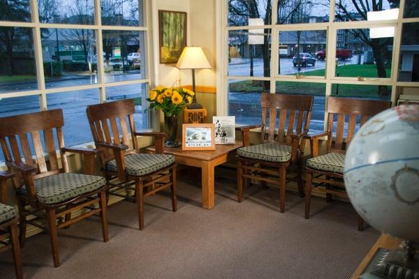 These beautiful old chairs came from a Masons Lodge in Iowa!  We have lots of windows and light at our office...