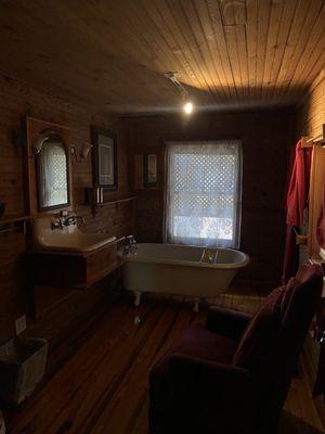 The inside bathroom, complete with bath salts and a claw foot tub!