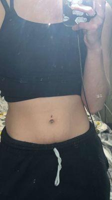 Belly button piercing.