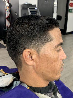 Men's classic haircut, men's taper, and men's line up.