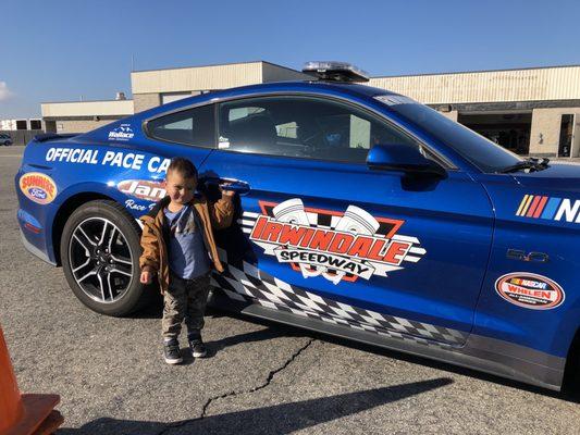 Grandson getting a picture with the pace car