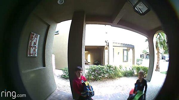 Screenshot of video from doorbell. my kids getting home from school.