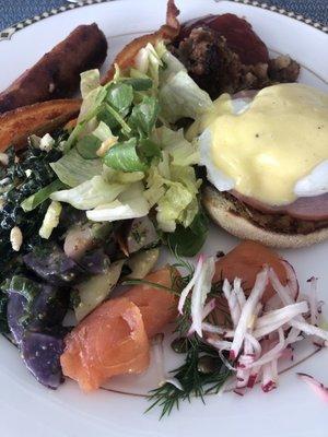 Sunday brunch extravagance:  eggs Benedict, smoked salmon, sausage, bacon, corned beef hash, Caesar salad, purple potato salad.