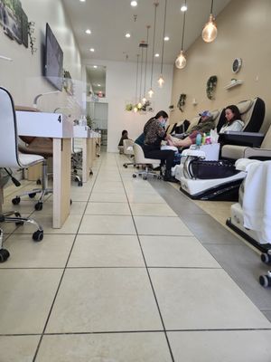 1/7/24 This time it is not I who is getting my nails done, but I am glad to see more males getting pedicures.