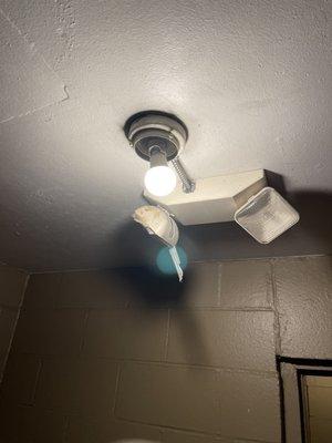 Broken light fixtures through the building