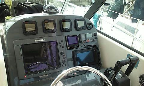 Pursuit Helm with Raymarine and Garmin navigation