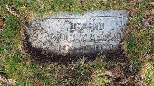 My uncle's headstone at the cemetery which has sunk down at least 4 to 5 in in the front/GONE unmaintained for years.