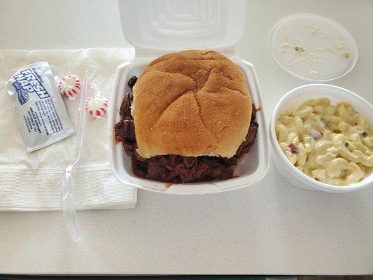 Slow smoked Pit BBQ  Beef Sandwich and regular macaroni salad.