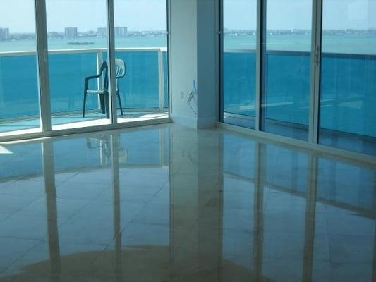 Marble floor grinded, sealed, polished and cristallized with high gloss shiny finish.