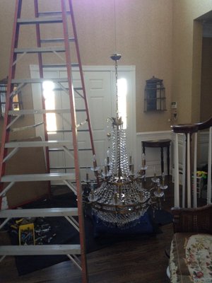 Key operated chandelier lift installed and wired in attic.