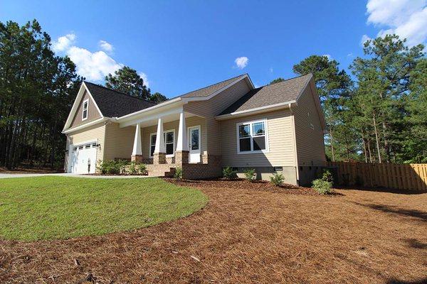 Installation of foundation plants, sod, and pine straw in Pinehurst NC