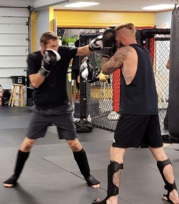 Stand Up/Striking class. Boxing, kickboxing, Muay Thai , strength training.