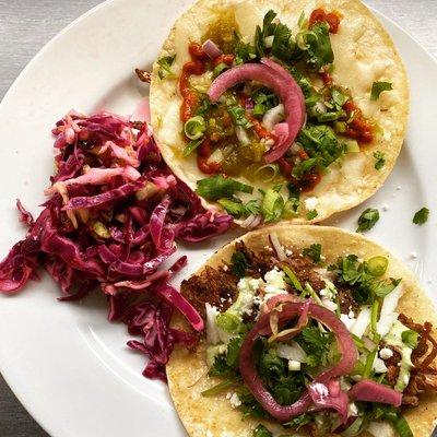 Oaxacan cheese and pork carnitas tacos