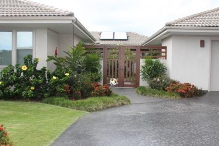 Keauhou Bay view Estates Custom Home. Courtyard entryway view. Home built by Kailua big island contractor General Construction