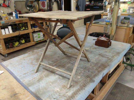 Customer had an old teak table worn, weathered from being outside.