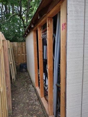 Removed rotted shed panel