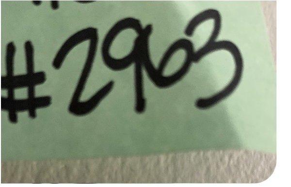 My number on the pick up ticket that was attached to my yellow bag.