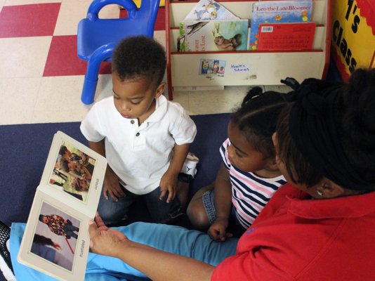 Teachers at Neighborhood Christian engage children in hands-on learning activities to help them reach important developmental milestones.