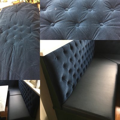 Tufted velour with leather seat cushions for a kitchen nook.