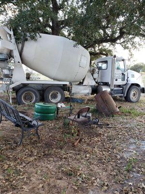 River City Ready Mix truck decided to drive thru my yard to turn around. Stuck under the branches.