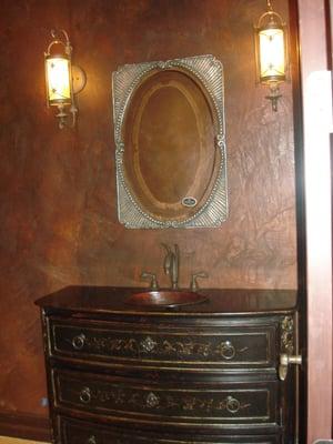 Elephant Hide wall finish, custom stained to compliment the copper sink.