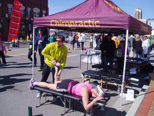 Treating runners at the Lansing Marathon with Active Release Techniques.