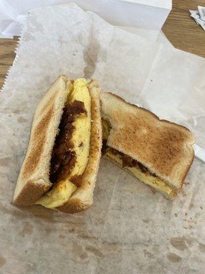 Egg and cheese sandwich with extra crispy bacon. Wonderful!