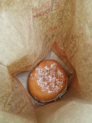 This is TLC...  Donut just tossed in bag without wax paper,  etc