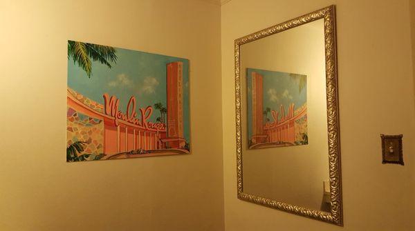 Art by local artist Lisa Dittrich adorns our ladies lounge.