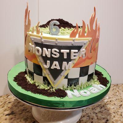 A birthday cake for a monster jamonster jam guy