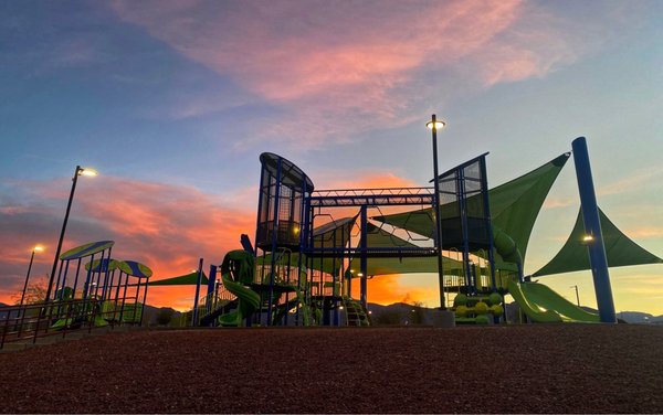 Sunset behind the Huckleberry Park playground - April 4, 2022.