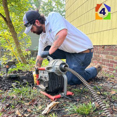 Drain Clearing Machine with Technician Terrance