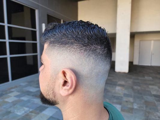 High Skin Fade with a Little Trim off top