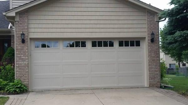 CHI long panel carriage door, with Madison window, installed in Troy