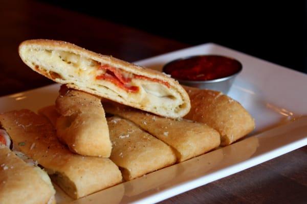 Pepperoni Roll- Pizza dough, Mozzarella, Provolone, Pepperoni & House Sauce