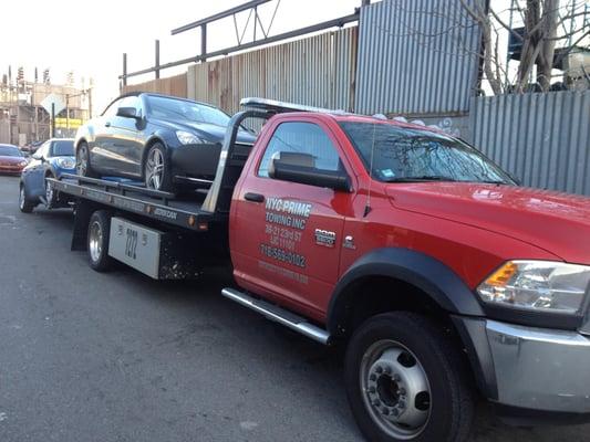 Fully Equipped Flatbed Tow Truck.