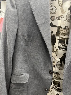 Damaged bespoke suit jacket