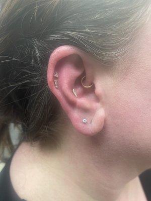 Two new helix piercings by Whitney