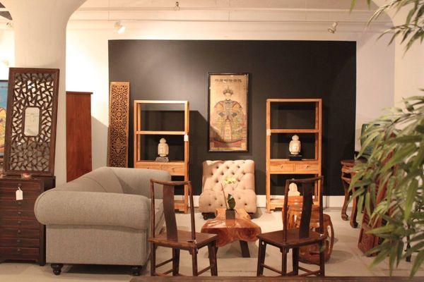 Chinese ancestor painting, chinese elmwood bookcases and chairs and British made chesterfield sofa...all sit so well together.