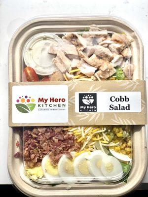 Cobb salad with chicken, bacon, eggs ,corn,cheese and tomatoes!