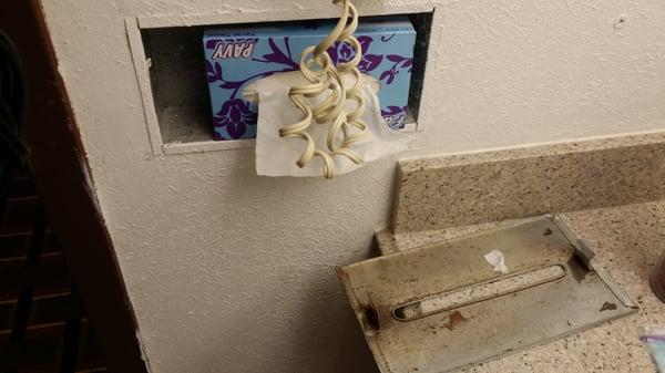 Rusted plate fell our and hit my foot! In wall kleenex dispenser.