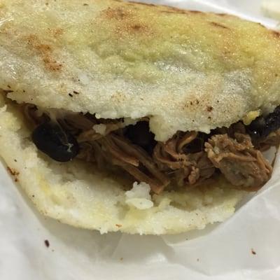 Pabellon...black beans shredded beef white cheese,and sweet plantains