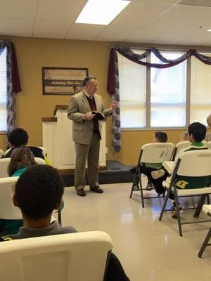 Pastor Emeritus, Dr. Don Smith, teaching to our grade school students.