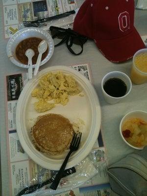 Walnut pancakes, scrambled eggs, beans, fruit cup, coffee and OJ for breakfast.