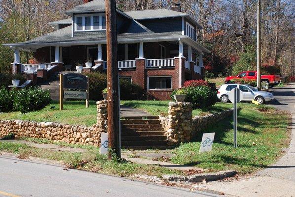 Adventure Cycles is located under toe porch of this newly restored inn, Blue Firefly Inn